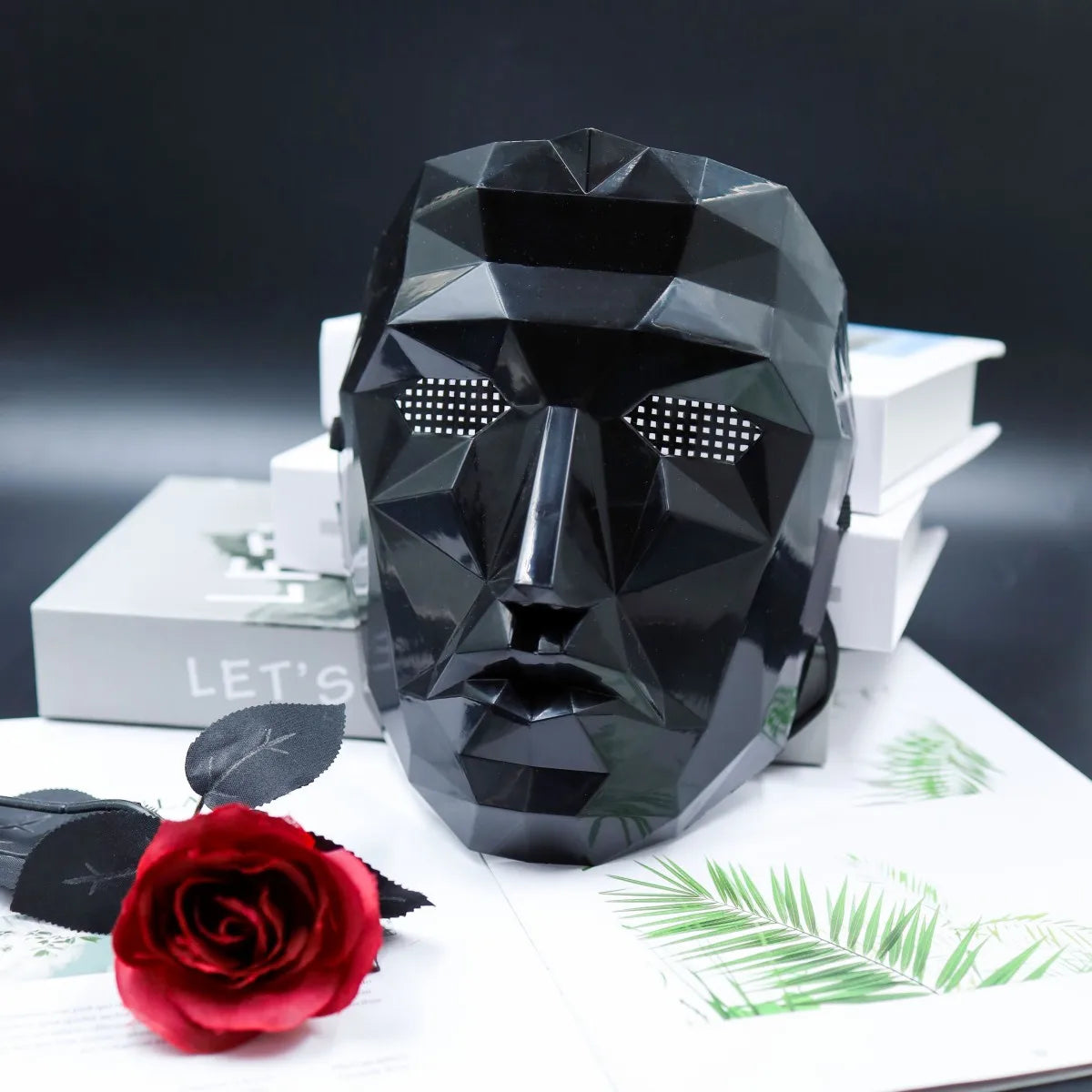 A black decorative mask, featuring a festive design, is ideal for cosplay parties, gala events, and decorative purposes.