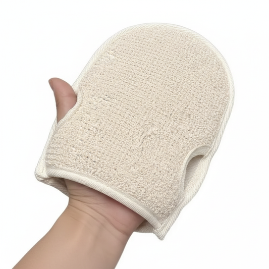 Hand wearing loofah glove close-up